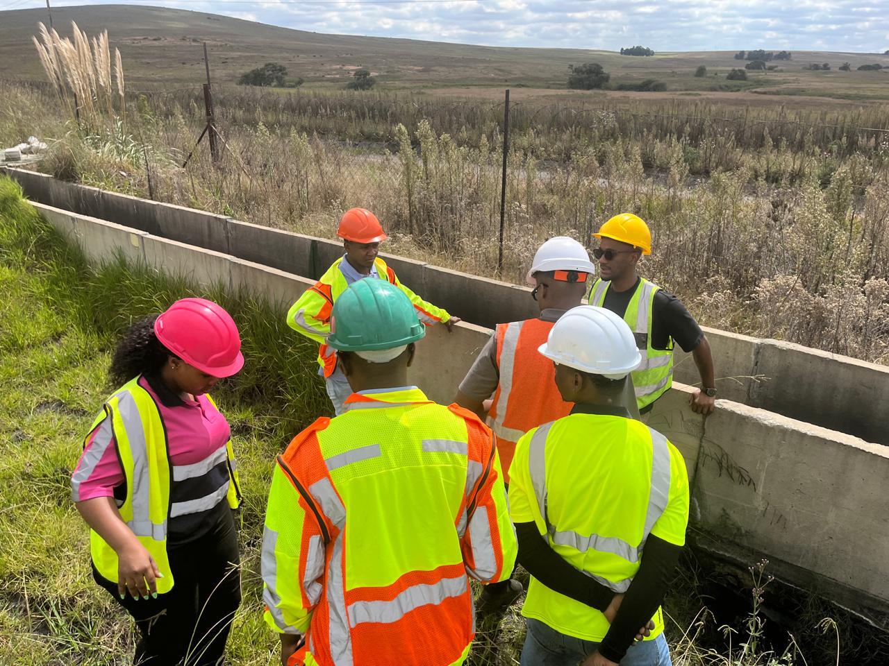 A group discussion beside site infrastructure