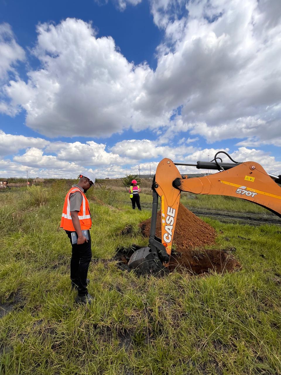 Excavation equipment and a team member on site